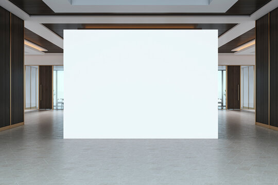 Blank display wall in modern gallery space with clean interior and subtle lighting suitable for poster, logo or signage mockup presentation. 3D Rendering