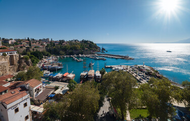 Naklejka premium Antalya, Türkiye - Kaleiçi old town and marina at sunrise. It is one of the popular tourism resorts of Antalya.