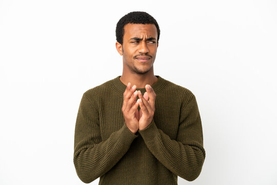 African American handsome man on isolated white background scheming something