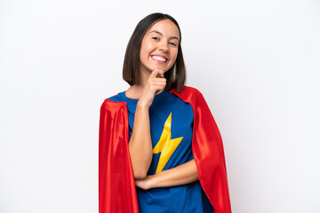 Super Hero caucasian woman isolated on white background smiling