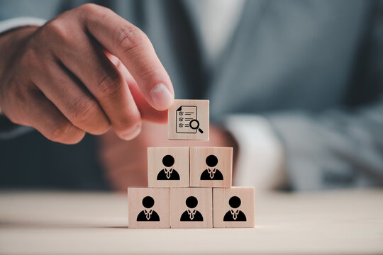 HR compliance, employee regulation and compliance, business ethics, employee performance evaluation concept. Wooden cube blocks with check mark and employees icons on clean background and copy space.