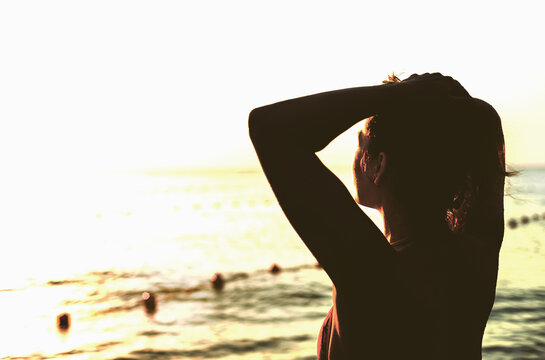 girl on sunny sea beach,