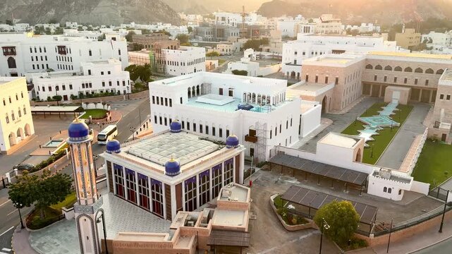 Pre-sunset view highlighting Omani and Islamic architecture in Mutrah with warm golden light and calm atmosphere.