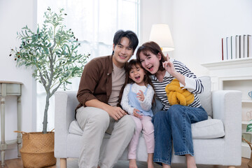 A family enjoys spending their time together in a living room