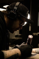 Tattoo artist makes a tattoo
