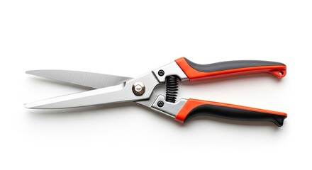 Fototapeta premium Sharp garden shears with orange and black handles, perfect for trimming plants and hedges