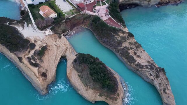 Aerial drone view of Canal d'Amour sandstone cliffs and turquoise sea in Sidari, Corfu Island, Greece, famous summer travel destination and geological landmark