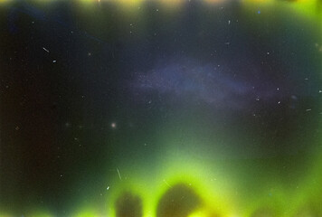 Abstract analog film grain texture with light leaks