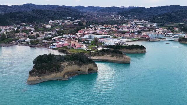 Wide Aerial Panorama of Sidari Coastal Resort Town and Rock Formations in Corfu Greece