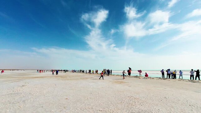 Lake Urmia Salt Lake Shore with Crowds and Mirror Waters