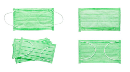 Set of green medical masks isolated on white background. Different views of protective surgical masks for respiratory health. Collection of sanitary face covers.