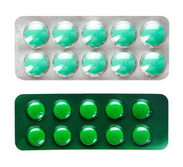 Green pills in blister packs isolated on white background.