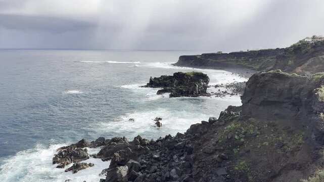 Stormy Winter View of Black Volcanic Coast at Charco la Laja Tenerife
