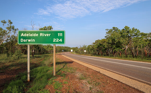 Distance road sign to Adelaide River and Darwin, on Stuart Highway, Australian Outback, Pine Creek, Northern Territory, Australia. Travel and tourism