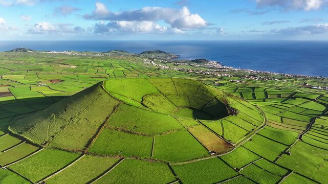 Patchwork quilt landscape around Pico Dona Joana on Terceira island, aerial