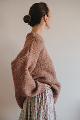 Casual Autumn Outfit With Woman Wearing Brown Knitwear And Vintage Style Skirt