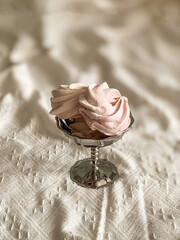 Pink marshmallows in a vase. Vintage aesthetic