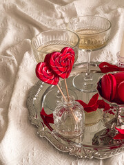 Dessert on a silver tray. Valentine`s Day aesthetic