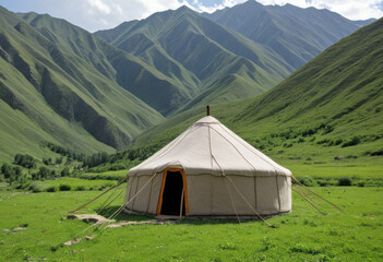 White felt tent house in rural Kyrgyzstan, in mountainous pastures