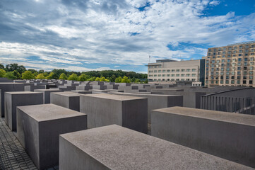 Berlin, germany, august 12, 2023. Memorial to the murdered jews of europe in berlin: geometric field of concrete stelae forming a solemn, contemplative urban maze © Massimo Parisi