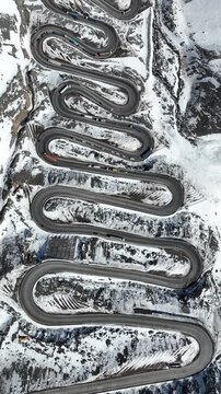 Los Caracoles highway road near Santiago Chile in aerial view. Snow highway road. Vertical video