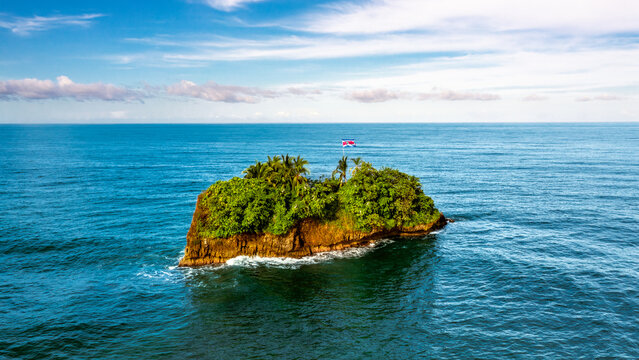 Drone view of the little island Isla Cocles at Playa Cocles on the Caribbean coast in Costa Rica