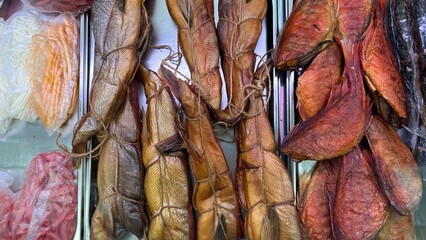 Hot smoked chum salmon belly and assorted smoked fish display  