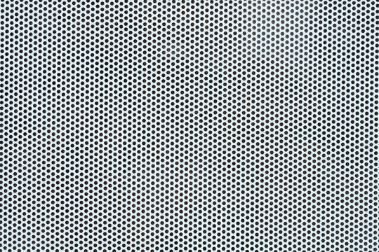 A gray perforated window sticker with a dense pattern of small circular holes designed for one way vision and solar protection