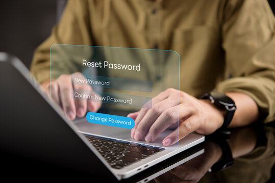 Man hands typing on laptop with virtual password reset interface. Concept of changing new password, account recovery, security update, and digital identity protection.