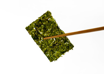 Korean seaweed with wooden chopsticks. Isolated on white background.