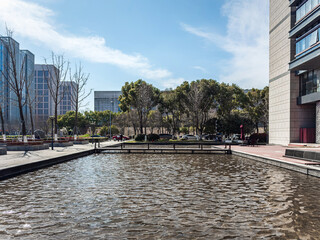 Serene Waterfront View in a Modern Urban Landscape with Reflection