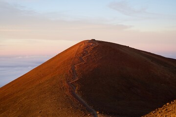 The summit of Mauna Kea bathed in morning sunlight