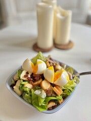 salad with soft boiled eggs
