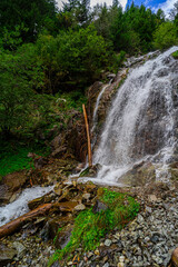 Obraz premium Hiking Trail to the Egger Waterfalls in the Antholz Valley South Tyrol in autumn 2025