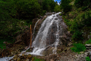 Obraz premium Hiking Trail to the Egger Waterfalls in the Antholz Valley South Tyrol in autumn 2025