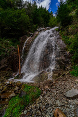 Obraz premium Hiking Trail to the Egger Waterfalls in the Antholz Valley South Tyrol in autumn 2025