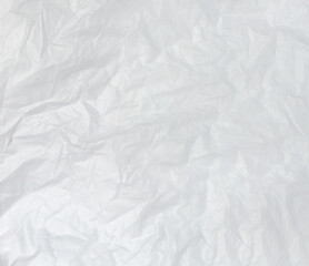 White Crumpled Paper Background Texture. Close-up paper texture.