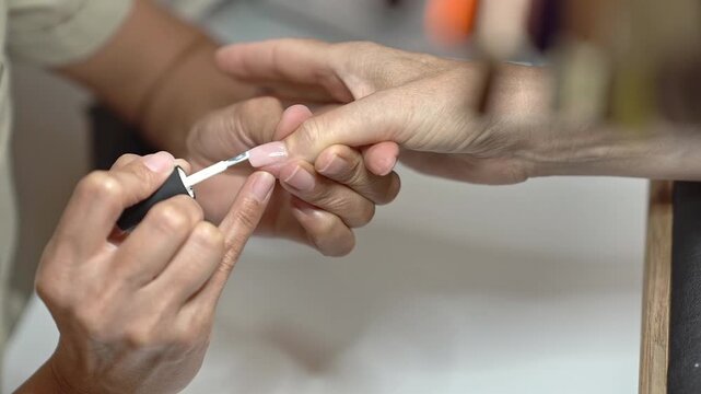 Step-by-step Guide to Classic French Manicure for Mature Hands. Application of the white tip