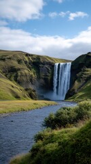 Fototapeta premium Majestic Skogafoss Waterfall Cascading Downside Surrounded by Lush Greenery