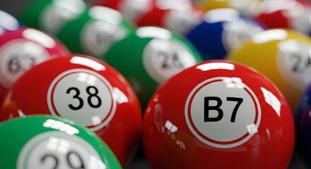 A close-up view of colorful bingo balls with numbers displayed prominently.