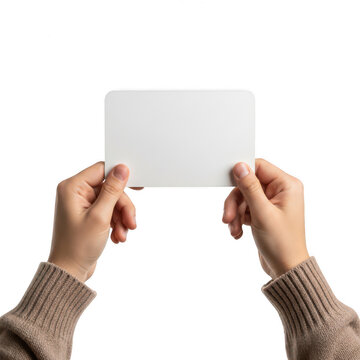 A person holding a blank white card with both hands against a plain background. isolated on transparent background