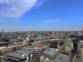Obraz premium The beautiful top view of the city with the blue sky