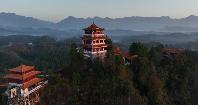 Sunrise and ancient chinese buddha temple landscape in Hunan province,China