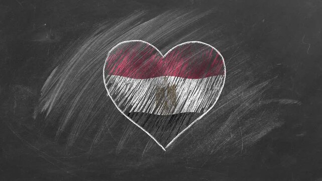 National flag of Egypt in heart shape  drawn with colored chalk on a blackboard