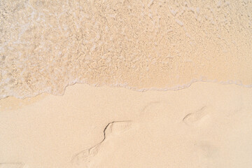 Footprint on sand beach 