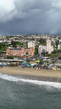 Vina del Mar in Chile with a rainbow. Beautiful aerial image of the coastline. Aerial view, vertical video