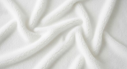 Soft white fabric with a textured surface and folds