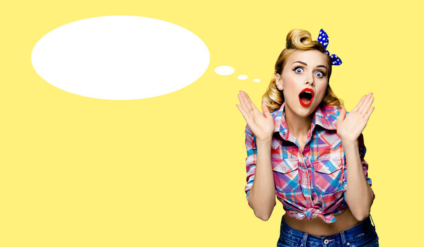 Sale ad image - expressive woman shout yelling, isolated yellow colour background, white empty mockup speech bubble. Cute girl in pinup pin up cloth raises hands, astonishment emotion. Mock