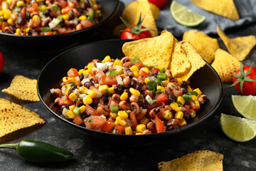 Naklejka premium Homemade Texas Caviar Bean Dip with corn chips