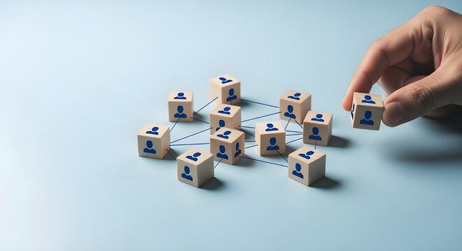 Organizational network structure with connected people icons on wooden blocks, showing team collaboration, stakeholder mapping, social graph, and business communication on a light background
